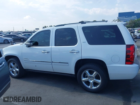 2013 Chevrolet Tahoe LTZ with VIN 1GNSKCE04DR374682, listed as a IAAI auction lot 42779526 with 139,533 mi miles and . Bid and sale history available at DreamBid. Image 14.