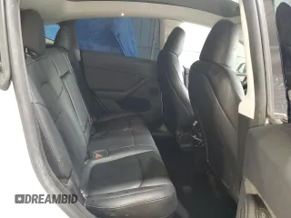 2024 Tesla Model Y Long Range с VIN 7SAYGDEE8RA266519, выставлен на аукционе Copart как лот 60899095 с пробегом Не указан миль и Списание • Salvage title. История ставок и продаж доступна на DreamBid. Изображение 10.