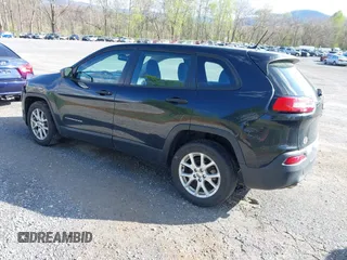 2014 Jeep Cherokee Sport with VIN 1C4PJLAB4EW110051, listed as a IAAI auction lot 41961698 with 153,570 mi miles and . Bid and sale history available at DreamBid. Image 3.