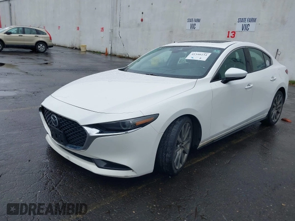 2020 Mazda 3 Premium with VIN 3MZBPBEMXLM133357, listed as a IAAI auction lot 41540234 with 81,280 mi miles and . Bid and sale history available at DreamBid. Image 19.