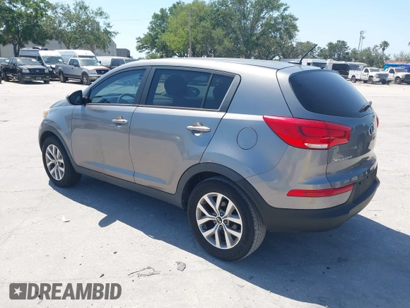 2014 Kia Sportage LX with VIN KNDPB3AC7E7595527, listed as a IAAI auction lot 42062615 with 64,777 mi miles. Bid and sale history available at carsss.com. Image 3.