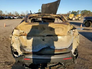 2024 Tesla Model Y with VIN 7SAYGDED6RA324943, listed as a Copart auction lot 43266965 with Not provided miles and Non repairable. Bid and sale history available at DreamBid. Image 6.