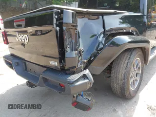 2020 Jeep Gladiator Overland with VIN 1C6HJTFG8LL176164, listed as a IAAI auction lot 42482369 with 80,009 mi miles and . Bid and sale history available at DreamBid. Image 6.