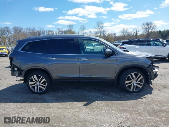 2016 Honda Pilot Elite with VIN 5FNYF6H06GB058392, listed as a IAAI auction lot 41983804 with 103,304 mi miles. Bid and sale history available at carsss.com. Image 14.