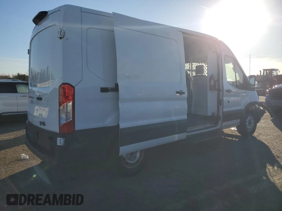 2019 Ford Transit z VIN 1FTYE2CM1KKB36255, wystawiony jako Copart lot #85185864 z przebiegiem 72 053 mil mil oraz Szkoda całkowita • Salvage title. Historia ofert i sprzedaży dostępna na DreamBid. Obrazek 3.