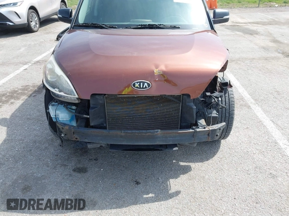 2012 Kia Soul + with VIN KNDJT2A63C7422074, listed as a IAAI auction lot 41911029 with 112,125 mi miles. Bid and sale history available at carsss.com. Image 6.