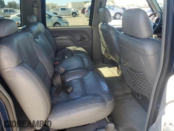 1999 Chevrolet Suburban with VIN 1GNEC16R1XJ394144, listed as a Copart auction lot 50418185 with 173,037 mi miles and Salvage title. Bid and sale history available at DreamBid. Image 11.