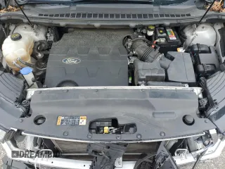 2015 Ford Edge SE z VIN 2FMTK3G85FBB58499, wystawiony jako Copart lot #56654025 z przebiegiem 93 626 mil mil oraz Szkoda całkowita • Salvage title. Historia ofert i sprzedaży dostępna na DreamBid. Obrazek 11.