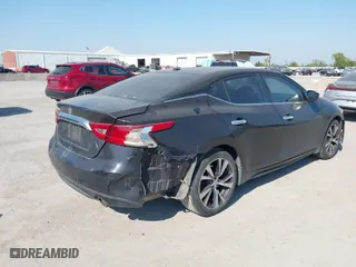 2016 Nissan Maxima 3.5 Platinum with VIN 1N4AA6AP1GC392064, listed as a IAAI auction lot 40609252 with 143,064 mi miles. Bid and sale history available at carsss.com. Image 4.