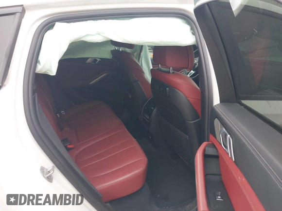 2021 BMW X6 M50i z VIN 5UXCY8C01M9E51506, wystawiony jako IAAI lot #41538726 z przebiegiem Nie podano mil oraz . Historia ofert i sprzedaży dostępna na DreamBid. Obrazek 8.