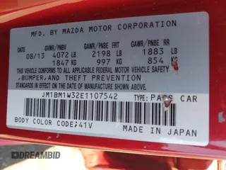 2014 Mazda 3 S Grand Touring with VIN JM1BM1W32E1107542, listed as a IAAI auction lot 42070484 with 132,395 mi miles and . Bid and sale history available at DreamBid. Image 9.