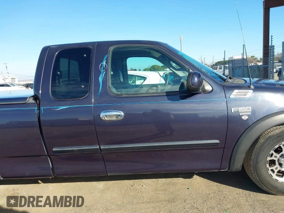 1999 Ford F-150 XL with VIN 1FTRX17L4XKA58054, listed as a IAAI auction lot 41647530 with 225,632 mi miles. Bid and sale history available at carsss.com. Image 13.
