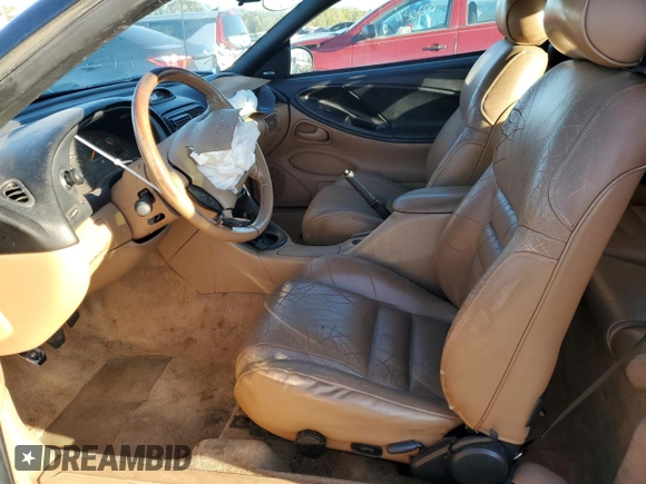 1996 Ford Mustang GT with VIN 1FALP45XXTF235504, listed as a Copart auction lot 45662595 with 57,849 mi miles and Salvage title. Bid and sale history available at DreamBid. Image 7.