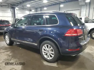 2014 Volkswagen Touareg Lux z VIN WVGEF9BP4ED006236, wystawiony jako Copart lot #47394505 z przebiegiem 85 179 mil mil oraz Szkoda całkowita • Salvage title. Historia ofert i sprzedaży dostępna na DreamBid. Obrazek 2.