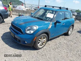 2011 MINI Countryman S with VIN WMWZC5C57BWM11279, listed as a IAAI auction lot 42649621 with 100,000 mi miles and . Bid and sale history available at DreamBid. Image 2.