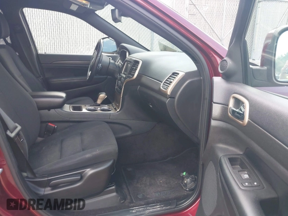 2016 Jeep Grand Cherokee Laredo with VIN 1C4RJFAG8GC318878, listed as a IAAI auction lot 42600747 with 85,882 mi miles and . Bid and sale history available at DreamBid. Image 5.