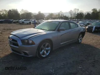 2013 Dodge Charger SE z VIN 2C3CDXBG8DH656182, wystawiony jako Copart lot #52180115 z przebiegiem 148 968 mil mil oraz Szkoda całkowita • Salvage title. Historia ofert i sprzedaży dostępna na DreamBid. Obrazek 1.