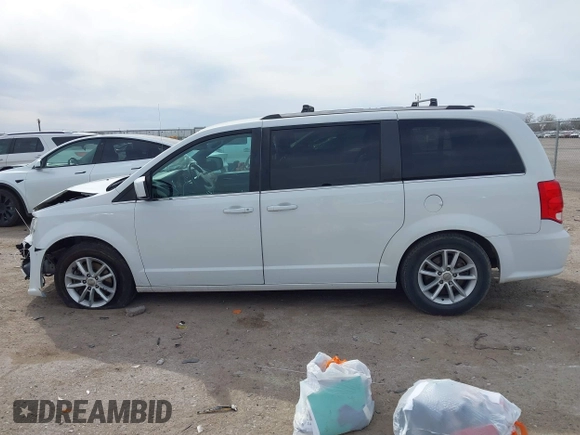 2018 Dodge Grand Caravan SXT with VIN 2C4RDGCG2JR283490, listed as a IAAI auction lot 41796929 with 157,836 mi miles and . Bid and sale history available at DreamBid. Image 14.