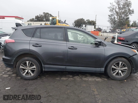 2018 Toyota RAV4 XLE z VIN JTMWFREV4JJ188776, wystawiony jako IAAI lot #41525603 z przebiegiem 110 743 mil mil oraz . Historia ofert i sprzedaży dostępna na DreamBid. Obrazek 13.