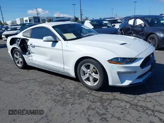 2021 Ford Mustang EcoBoost with VIN 1FA6P8TH5M5146799, listed as a IAAI auction lot 41575950 with 47,037 mi miles. Bid and sale history available at carsss.com. Image 1.
