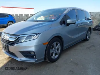 2019 Honda Odyssey EX-L with VIN 5FNRL6H79KB043145, listed as a IAAI auction lot 41569198 with 94,560 mi miles. Bid and sale history available at carsss.com. Image 2.