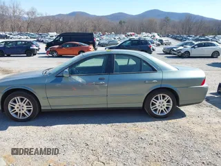 2003 Lincoln LS Sport with VIN 1LNHM87A33Y677386, listed as a IAAI auction lot 41890308 with 139,498 mi miles. Bid and sale history available at carsss.com. Image 14.