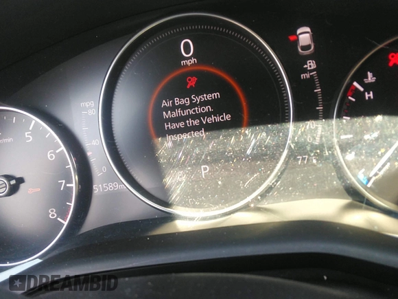 2022 Mazda CX-30 S Carbon Edition with VIN 3MVDMBCL6NM423255, listed as a IAAI auction lot 42209829 with 51,589 mi miles and . Bid and sale history available at DreamBid. Image 7.