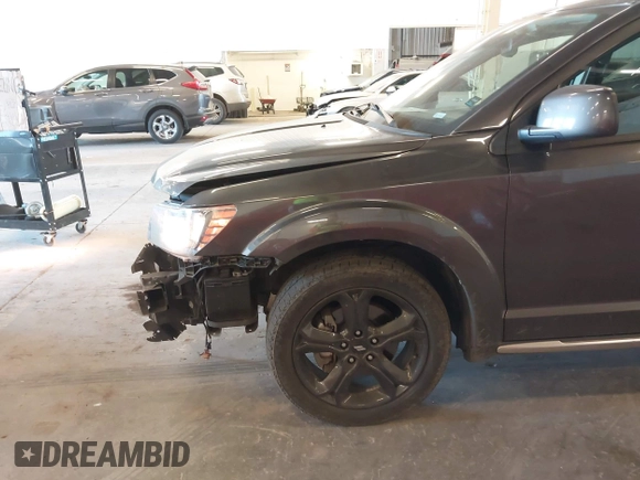2019 Dodge Journey Crossroad z VIN 3C4PDCGG9KT717767, wystawiony jako IAAI lot #42179967 z przebiegiem 98 686 mil mil oraz . Historia ofert i sprzedaży dostępna na DreamBid. Obrazek 6.