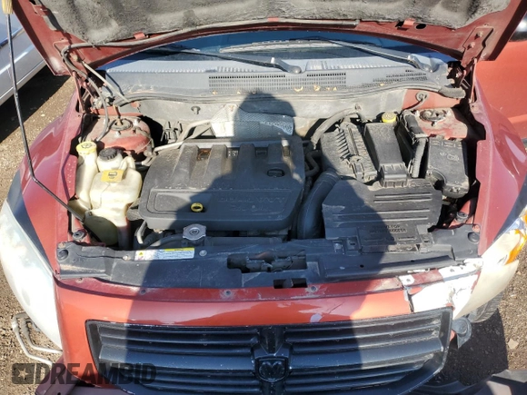 2009 Dodge Caliber SXT with VIN 1B3HB48A89D119892, listed as a Copart auction lot 52505545 with 219,227 mi miles and Salvage Title. Bid and sale history available at carsss.com. Image 11.