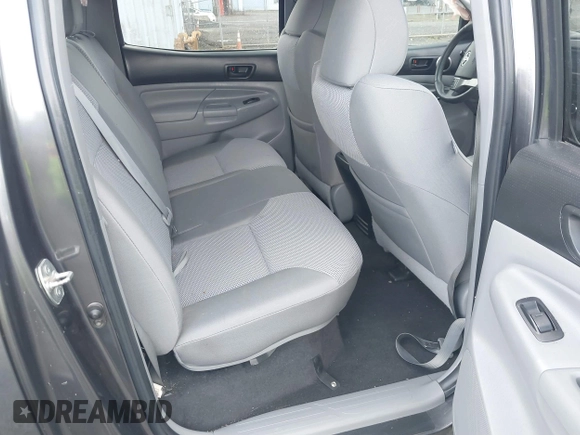 2013 Toyota Tacoma with VIN 3TMLU4ENXDM105967, listed as a IAAI auction lot 41819211 with 121,012 mi miles and . Bid and sale history available at DreamBid. Image 8.