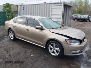2015 Volkswagen Passat S with VIN 1VWAS7A31FC096693, listed as a IAAI auction lot 41946462 with 90,801 mi miles and . Bid and sale history available at DreamBid. Image 1.