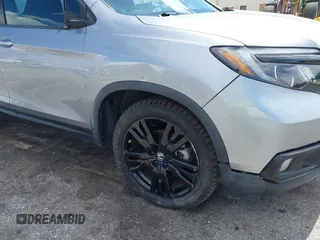 2021 Honda Passport Sport with VIN 5FNYF8H24MB004016, listed as a IAAI auction lot 41696379 with 85,373 mi miles and . Bid and sale history available at DreamBid. Image 18.