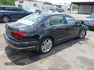 2017 Volkswagen Passat SE with VIN 1VWGT7A32HC034410, listed as a IAAI auction lot 42470146 with 96,226 mi miles and . Bid and sale history available at DreamBid. Image 4.