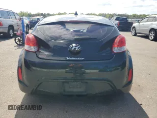 2013 Hyundai Veloster w/Gray Int z VIN KMHTC6ADXDU092253, wystawiony jako Copart lot #57708055 z przebiegiem 141 904 mil mil oraz Tytuł czysty. Historia ofert i sprzedaży dostępna na DreamBid. Obrazek 6.