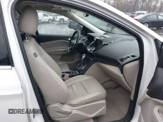 2014 Ford Escape Titanium with VIN 1FMCU9J94EUD49614, listed as a IAAI auction lot 42005864 with 87,779 mi miles. Bid and sale history available at carsss.com. Image 5.