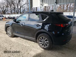 2023 Mazda CX-5 2.5 S Preferred Package with VIN JM3KFBCM2P0273945, listed as a Copart auction lot 46527055 with 21,555 mi miles and Salvage Title. Bid and sale history available at carsss.com. Image 2.