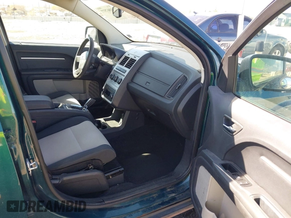 2009 Dodge Journey SXT with VIN 3D4GG57V09T170094, listed as a IAAI auction lot 41867577 with 122,831 mi miles. Bid and sale history available at carsss.com. Image 5.