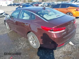 2016 Kia Optima LX Turbo with VIN 5XXGT4L14GG001906, listed as a IAAI auction lot 41543931 with 34,907 mi miles. Bid and sale history available at carsss.com. Image 3.