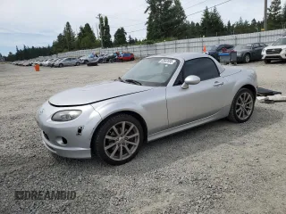 2008 Mazda MX-5 Miata Touring with VIN JM1NC26F780146072, listed as a Copart auction lot 65602695 with 124,607 mi miles and Salvage title. Bid and sale history available at DreamBid. Image 1.