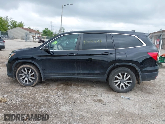 2020 Honda Pilot EX-L with VIN 5FNYF6H57LB059332, listed as a IAAI auction lot 42614422 with 110,279 mi miles and . Bid and sale history available at DreamBid. Image 14.