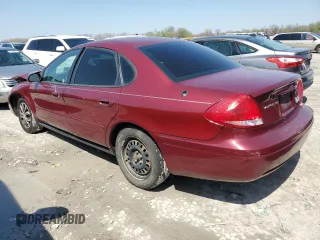 2007 Ford Taurus SE z VIN 1FAFP53U07A165204, wystawiony jako Copart lot #52170345 z przebiegiem Nie podano mil oraz Szkoda całkowita • Salvage title. Historia ofert i sprzedaży dostępna na DreamBid. Obrazek 2.