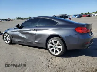 2015 BMW 4 Series 428i with VIN WBA3N7C54FK222324, listed as a Copart auction lot 57644345 with 114,696 mi miles and Salvage title. Bid and sale history available at DreamBid. Image 2.