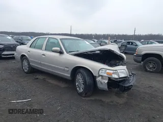2009 Mercury Grand Marquis LS with VIN 2MEHM75VX9X613986, listed as a IAAI auction lot 41651335 with 82,391 mi miles. Bid and sale history available at carsss.com. Image 1.