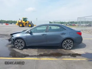 2019 Toyota Corolla L with VIN 2T1BURHE6KC223220, listed as a IAAI auction lot 42005148 with 121,736 mi miles and . Bid and sale history available at DreamBid. Image 14.