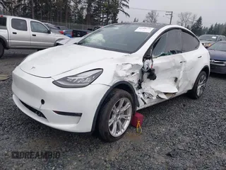 2022 Tesla Model Y Long Range z VIN 7SAYGDEE6NF451259, wystawiony jako IAAI lot #41200775 z przebiegiem 59 683 mil mil oraz . Historia ofert i sprzedaży dostępna na DreamBid. Obrazek 20.