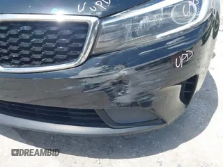 2018 Kia Forte LX z VIN 3KPFK4A70JE197056, wystawiony jako IAAI lot #42435555 z przebiegiem 79 805 mil mil oraz . Historia ofert i sprzedaży dostępna na DreamBid. Obrazek 18.