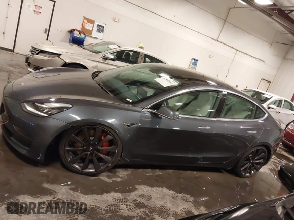 2020 Tesla Model 3 Performance z VIN 5YJ3E1EC3LF641768, wystawiony jako IAAI lot #41542615 z przebiegiem 43 343 mil mil oraz . Historia ofert i sprzedaży dostępna na DreamBid. Obrazek 15.