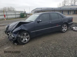 2002 Mercedes-Benz E-Class with VIN WDBJF82J62X063720, listed as a Copart auction lot 84763074 with 0 mi miles and Salvage Title. Bid and sale history available at carsss.com. Image 1.