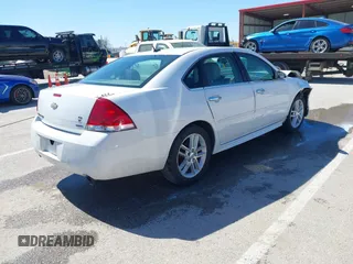 2014 Chevrolet Impala LTZ with VIN 2G1WC5E36E1182793, listed as a IAAI auction lot 41817899 with 171,776 mi miles and . Bid and sale history available at DreamBid. Image 4.