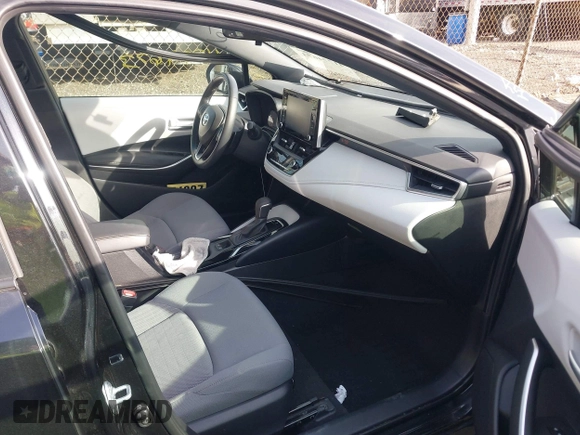2021 Toyota Corolla SE with VIN 5YFS4MCE1MP082859, listed as a IAAI auction lot 41774673 with 34,006 mi miles. Bid and sale history available at carsss.com. Image 5.